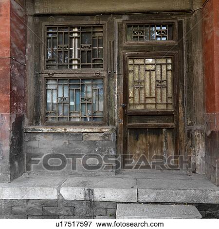 Stock Photo - Weathered window with a door of a building at the Imperial Garden, Forbidden City, Beijing, China. Fotosearch