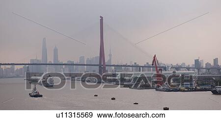 Stock Photo - Yangpu Bridge across Huangpu River, Shanghai, China. Fotosearch