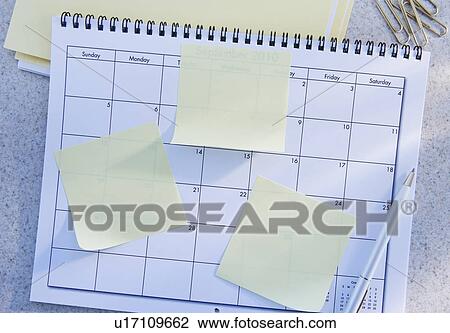 Blank adhesive notes on calendar View Large Photo Image Stock Image - Blank adhesive notes on calendar. Fotosearch