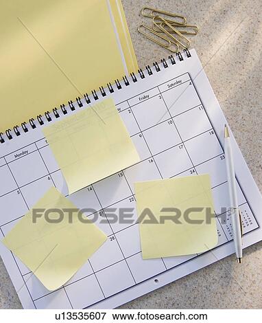 Blank adhesive notes on calendar View Large Photo Image Stock Photo - Blank adhesive notes on calendar. Fotosearch