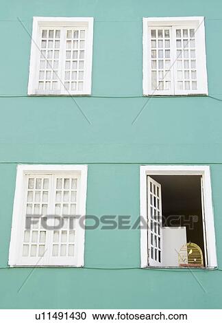 Brazil, Bahia, Salvador De Bahia, Facade of building with birdcage on open window View Large Photo Image Stock Image - Brazil, Bahia, Salvador De Bahia, Facade of building with birdcage on open window. Fotosearch