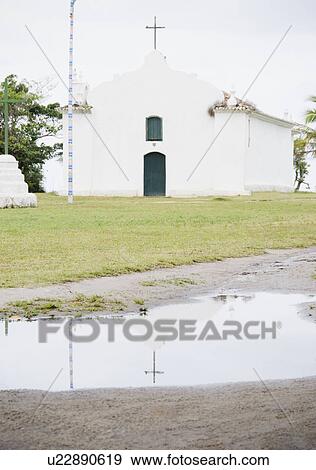 Brazil, Bahia, Trancoso, Church reflecting in puddle View Large Photo Image Stock Photo - Brazil, Bahia, Trancoso, Church reflecting in puddle. Fotosearch