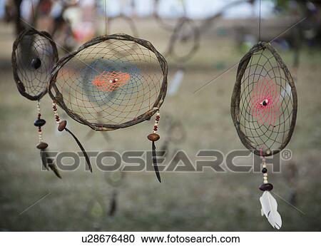 Stock Image - Brazil, Bahia, Trancoso, Dream catchers hanging. Fotosearch