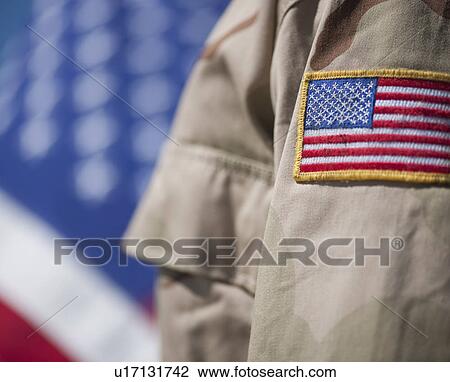 Close-up of badge with American flag on US military uniform View Large Photo Image Stock Image - Close-up of badge with American flag on US military uniform. Fotosearch