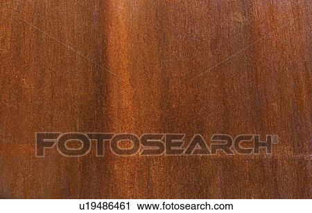 Stock Image - Close-up of brown wooden surface. Fotosearch