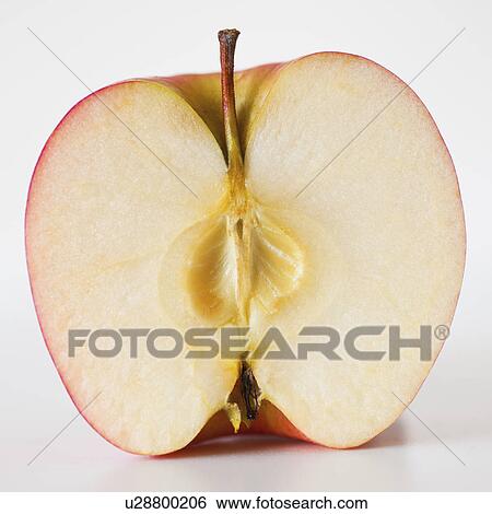 Close up of half of apple, studio shot View Large Photo Image Stock Photograph - Close up of half of apple, studio shot. Fotosearch