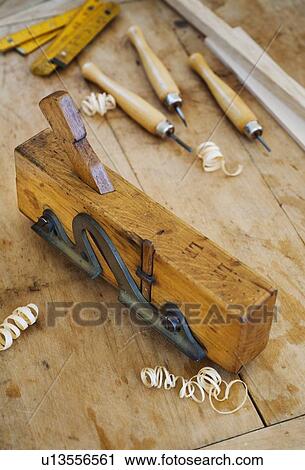 Close up of plane and chisels on wood View Large Photo Image Stock Image - Close up of plane and chisels on wood. Fotosearch