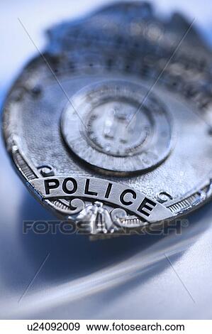 Close-up of police badge, studio shot View Large Photo Image Stock Photo - Close-up of police badge, studio shot. Fotosearch