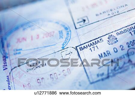 Close-up of stamps in passport View Large Photo Image Stock Photograph - Close-up of stamps in passport. Fotosearch