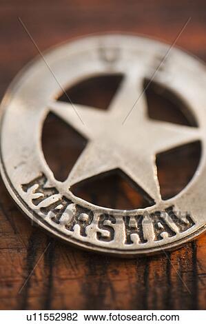 Stock Image - Close-up of United States Marshal badge. Fotosearch