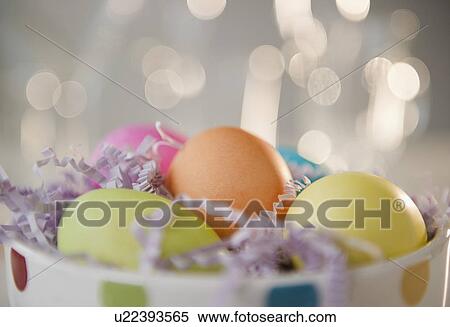 Colored Easter eggs in bowl, studio shot View Large Photo Image Stock Photography - Colored Easter eggs in bowl, studio shot. Fotosearch