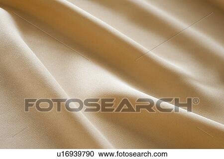 Stock Image - Cream colored silk. Fotosearch