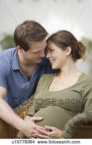 Picture - Expecting couple. Fotosearch