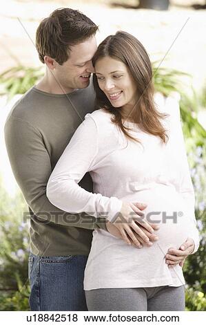 Stock Photo - Expecting couple. Fotosearch