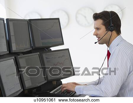 Financial worker analyzing data displayed on computer screen View Large Photo Image Stock Image - Financial worker analyzing data displayed on computer screen. Fotosearch