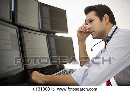 Financial worker analyzing data displayed on computer screen View Large Photo Image Stock Photography - Financial worker analyzing data displayed on computer screen. Fotosearch