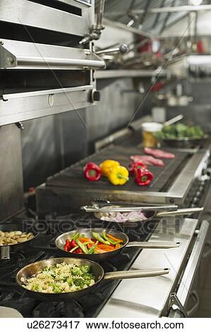 Food in commercial kitchen View Large Photo Image Stock Photo - Food in commercial kitchen. Fotosearch