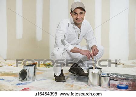 House painter stirring paint View Large Photo Image Stock Photo - House painter stirring paint. Fotosearch