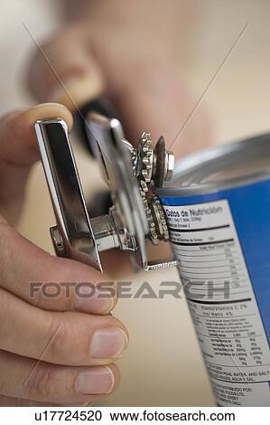 Man opening can View Large Photo Image Stock Image - Man opening can. Fotosearch