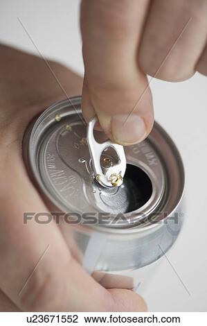 Man opening drink can View Large Photo Image Stock Image - Man opening drink can. Fotosearch