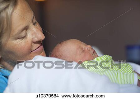 Mother with baby boy (0-1 months) View Large Photo Image Picture - Mother with baby boy (0-1 months). Fotosearch
