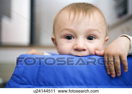 Stock Image - Portrait of baby boy (0-1 years). Fotosearch