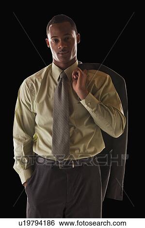Stock Photograph - Portrait of confident businessman. Fotosearch