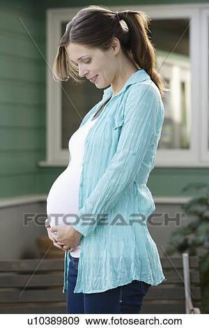 Portrait of expectant mother View Large Photo Image Stock Photo - Portrait of expectant mother. Fotosearch