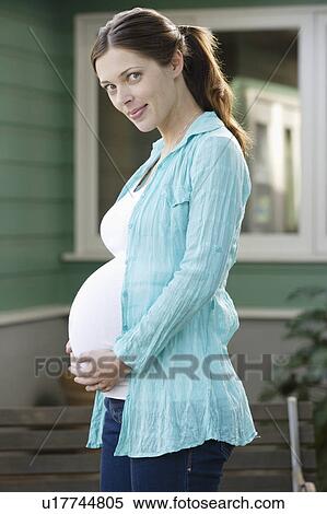 Stock Photography - Portrait of expectant mother. Fotosearch