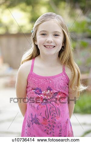 Portrait of girl (4-5) smiling View Large Photo Image Picture - Portrait of girl (4-5) smiling. Fotosearch