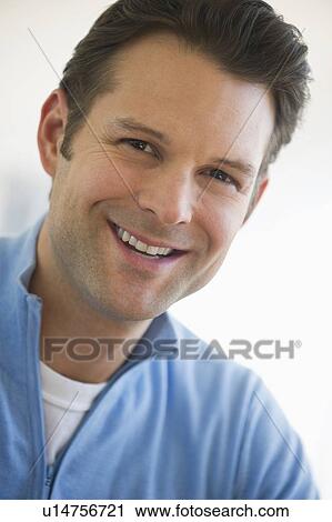 Portrait of mid adult man smiling View Large Photo Image Stock Image - Portrait of mid adult man smiling. Fotosearch