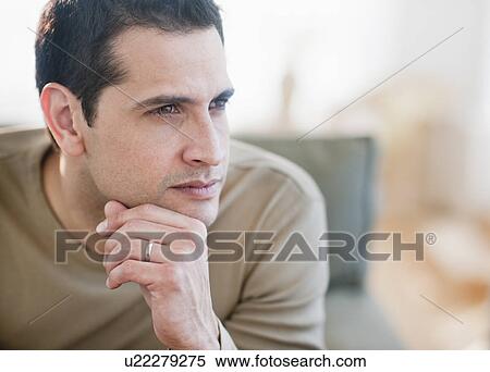 Stock Photography - Portrait of mid adult man. Fotosearch