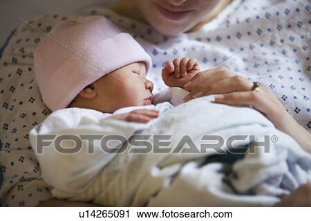 Portrait of newborn girl (0-1months) with mother View Large Photo Image Stock Image - Portrait of newborn girl (0-1months) with mother. Fotosearch