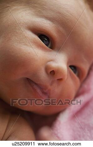 Portrait of newborn girl (0-1months) View Large Photo Image Stock Image - Portrait of newborn girl (0-1months) . Fotosearch