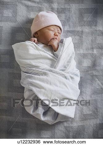 Portrait of newborn girl (0-1months) View Large Photo Image Stock Photograph - Portrait of newborn girl (0-1months). Fotosearch