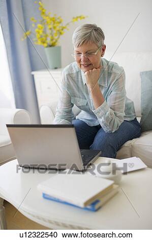 Stock Image - Portrait of senior woman. Fotosearch