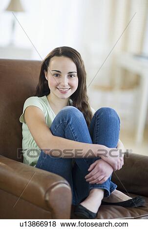Stock Photo - Portrait of teenage girl (14-15). Fotosearch