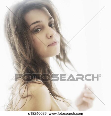 Stock Photograph - Portrait of young attractive woman. Fotosearch
