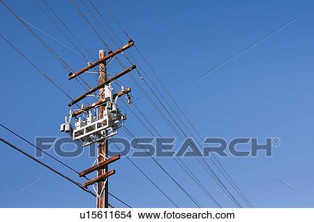 Power line against blue sky View Large Photo Image Picture - Power line against blue sky. Fotosearch