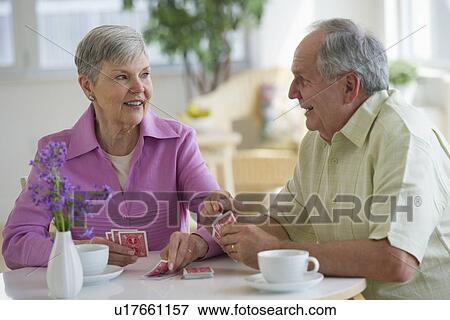Senior couple playing cards View Large Photo Image Stock Photo - Senior couple playing cards. Fotosearch