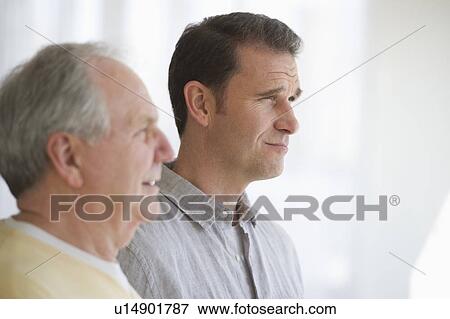 Stock Photo - Senior father with adult son. Fotosearch