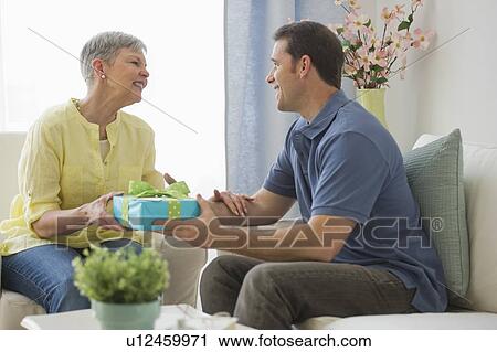 Senior woman with adult son View Large Photo Image Stock Image - Senior woman with adult son. Fotosearch
