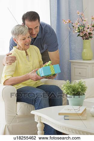 Senior woman with adult son View Large Photo Image Stock Image - Senior woman with adult son. Fotosearch