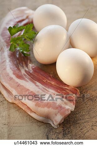 Studio shot of bacon and eggs View Large Photo Image Stock Image - Studio shot of bacon and eggs. Fotosearch