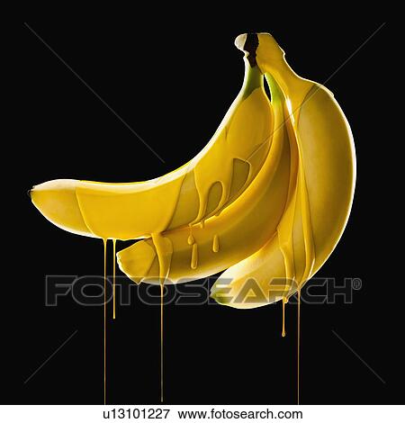 Studio shot of bananas covered with yellow paint View Large Photo Image Stock Photo - Studio shot of bananas covered with yellow paint. Fotosearch