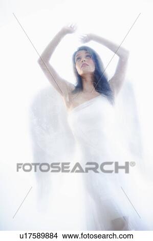 Picture - Studio shot of beautiful angel. Fotosearch