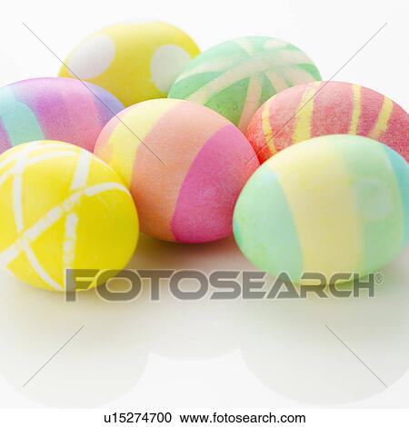 Stock Image - Studio shot of colorful Easter eggs. Fotosearch