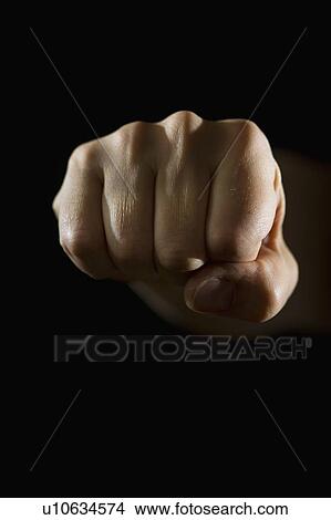 Picture - Studio shot of fist. Fotosearch