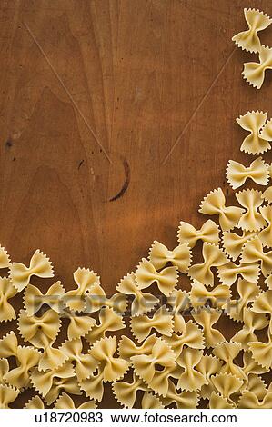 Studio shot of fresh bowtie pasta View Large Photo Image Stock Image - Studio shot of fresh bowtie pasta. Fotosearch