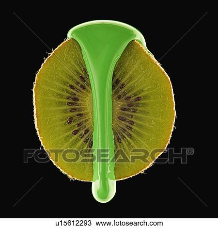 Stock Image - Studio shot of kiwi covered with green paint. Fotosearch